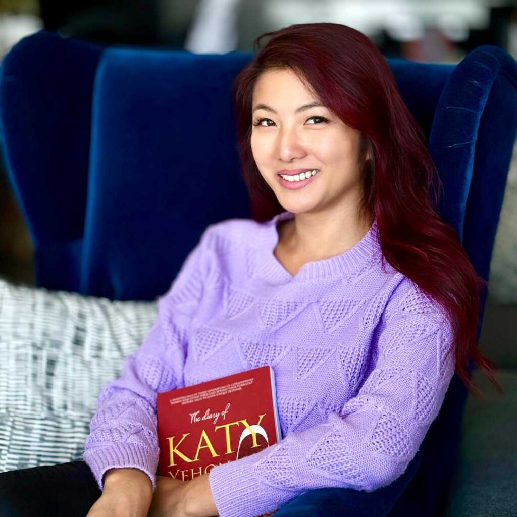 Kathleen Xu with the Diary of Katy Yehonala book