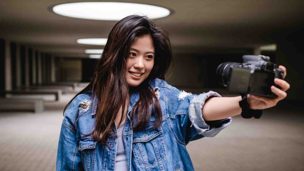 Asian Australian Women taking a selfie for Robert Barclay's Butterfly Dynasty series