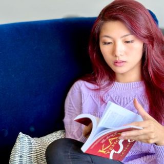 Young Asian woman reading The Diary of Katy Yehonala